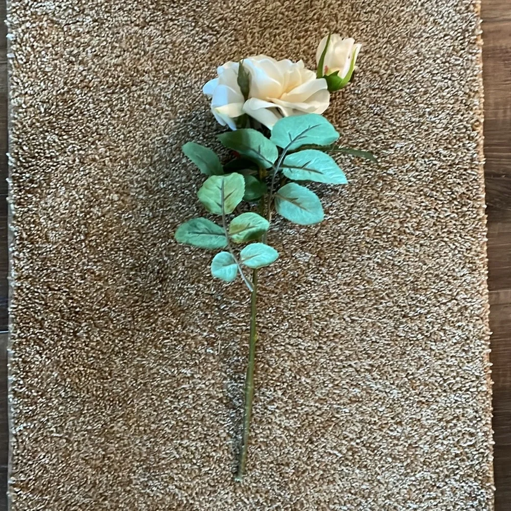 Beautiful realistic looking blooming rose with bud